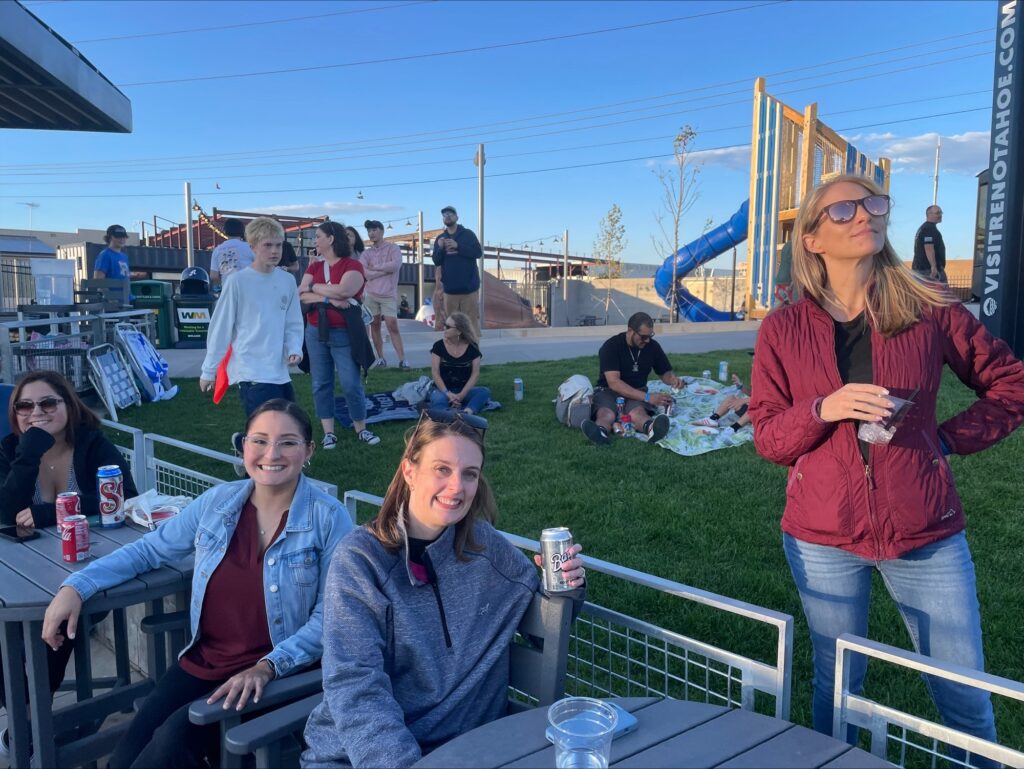 Inline image showing members of the LP Insurance team bonding at a local baseball game. 