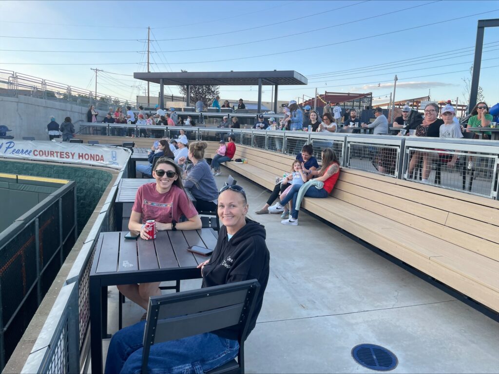 Inline image showing the LP Insurance team at a Reno Aces game. 