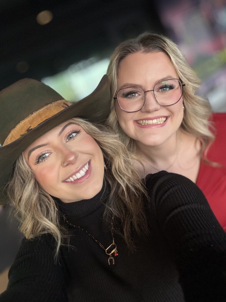 Selfie of two LP Insurance staff members smiling at the camera. 